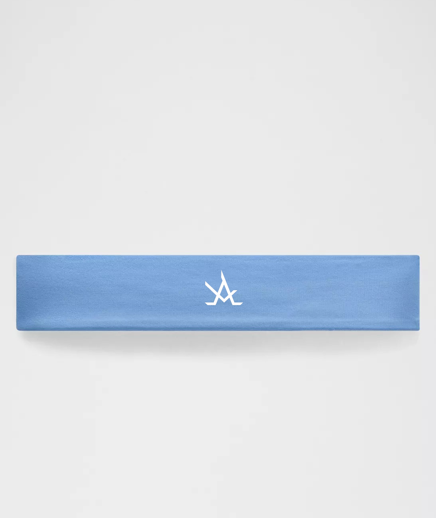 Blue women's training headband with moisture-wicking, non-slip design and wide coverage for athletic use