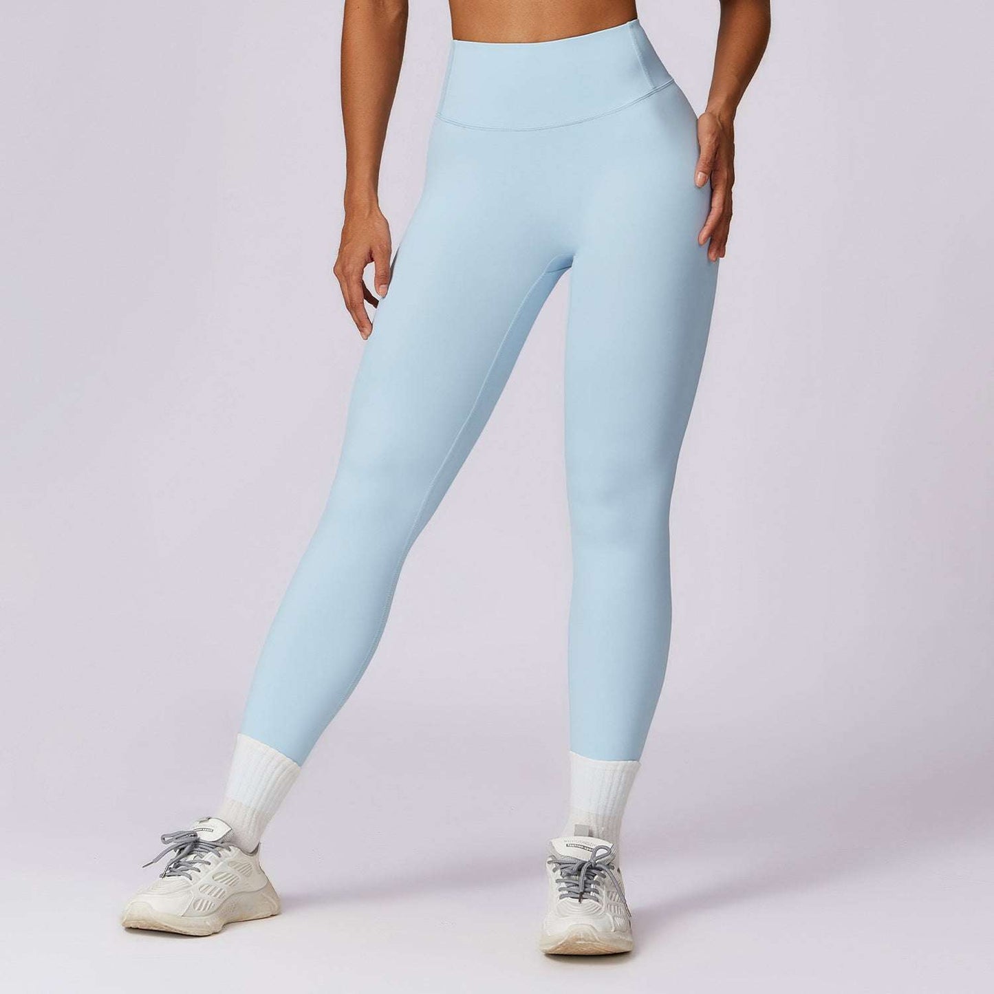 high-waist light blue women's gym leggings with flexible waistband and breathable fabric