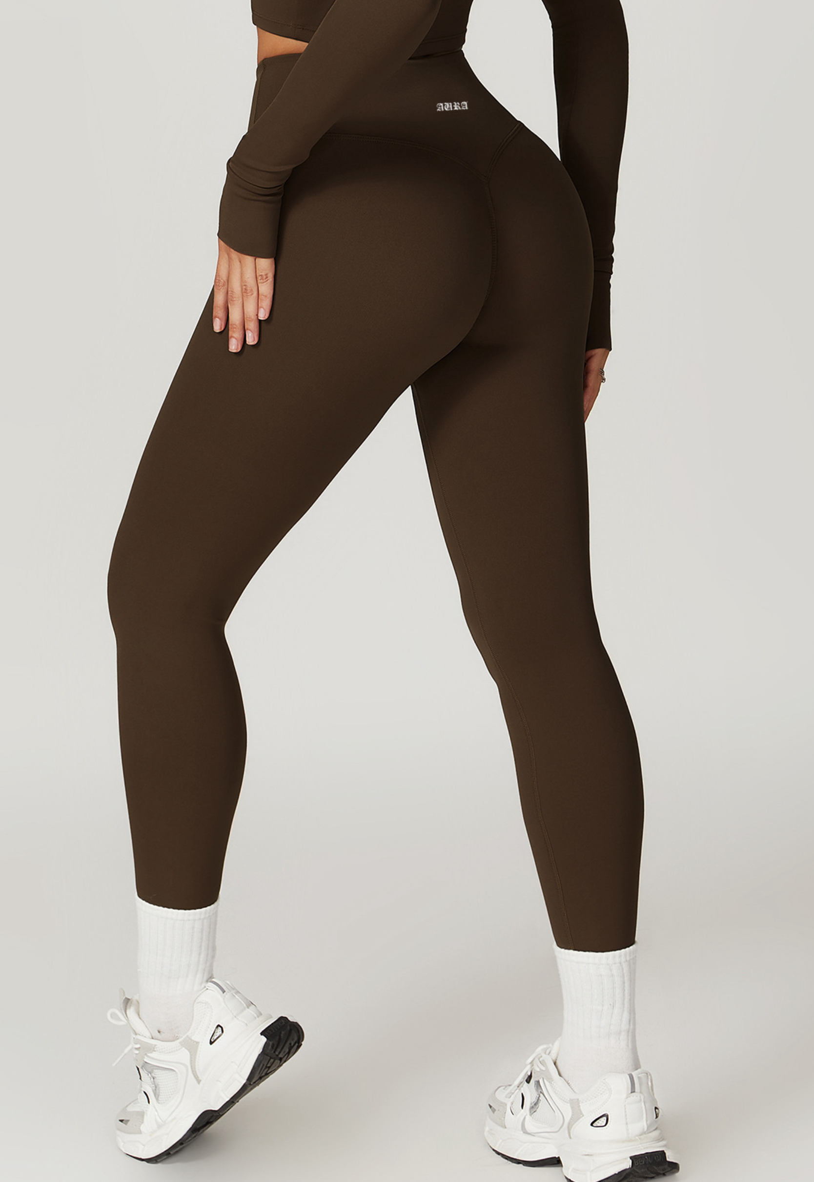 Aura Women’s plum high-waist squat-proof leggings for women in dark plum color with flexible waistband and four-way stretch for gym and yoga