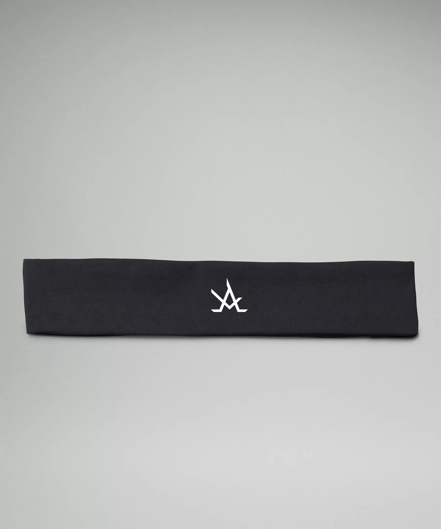 Black women's training headband with moisture-wicking, non-slip fabric and logo detail