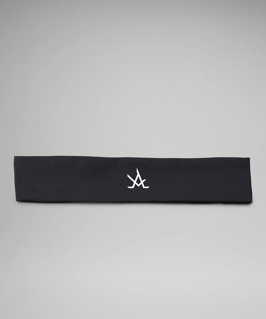 Black women's training headband with moisture-wicking, non-slip fabric and logo detail