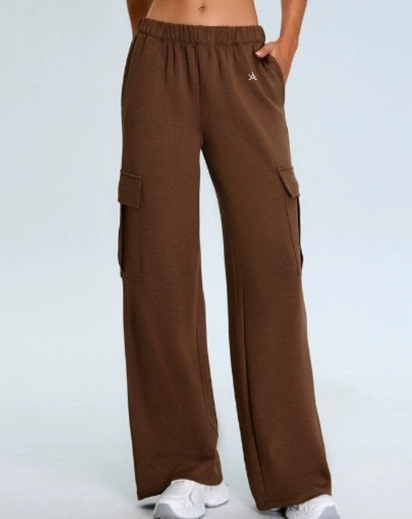 Women's premium active sweat pants in brown with cargo pockets, elastic waistband, and wide-leg fit for workout and athleisure comfort