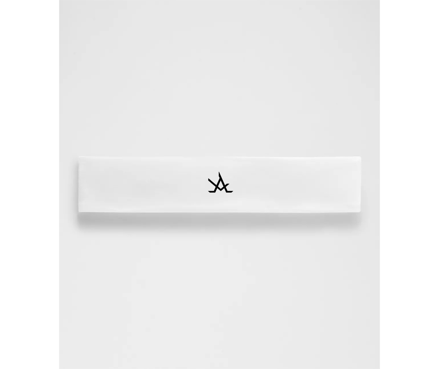 White women's training headband with moisture-wicking and non-slip features, 10cm wide for full forehead coverage.